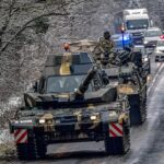 NATO-Truppen durchqueren das Land auf dem Weg zu einem Großmanöver